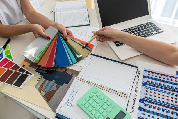 istock two architecture designer discussing about on blueprint with architect equipment and color sapmler 1359520639