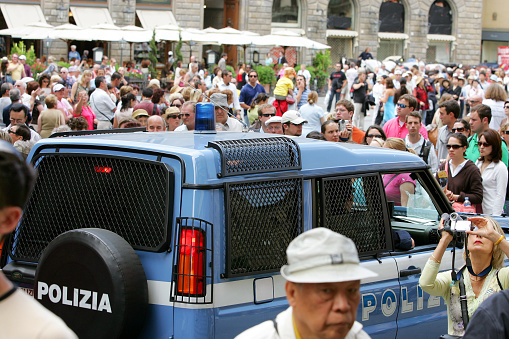 Florence, Italy - June 09 2006: Police checks. Police control operations in the city center. A Police patrol in the Piazza della Signoria crowded of tourists.