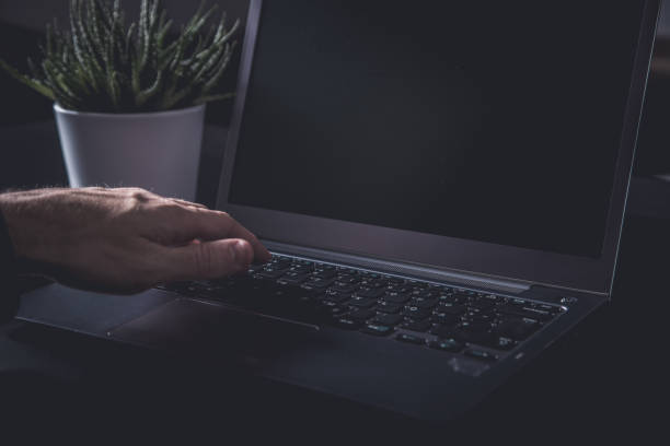 istock Businessman using a smartphone and notebook in a moddy office 1359520953