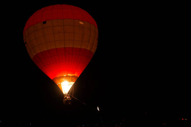 istock Air balloon in the evening sky 1359521296