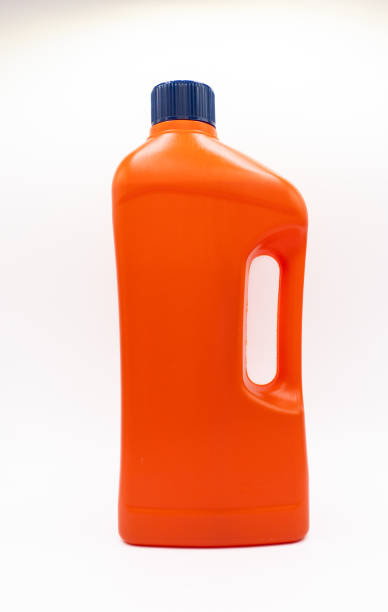 istock orange plastic bottle with blue cap for household chemicals 1359523035