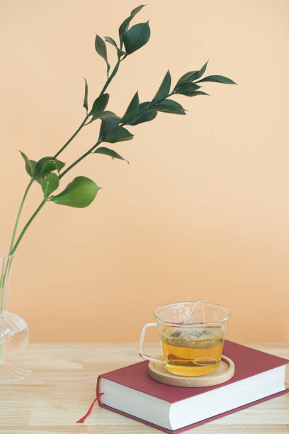 tea bag in a glass on book