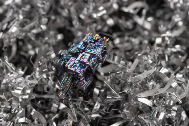 istock Bismuth crystals closeup on metal shavings. Great wallpaper 1359527063