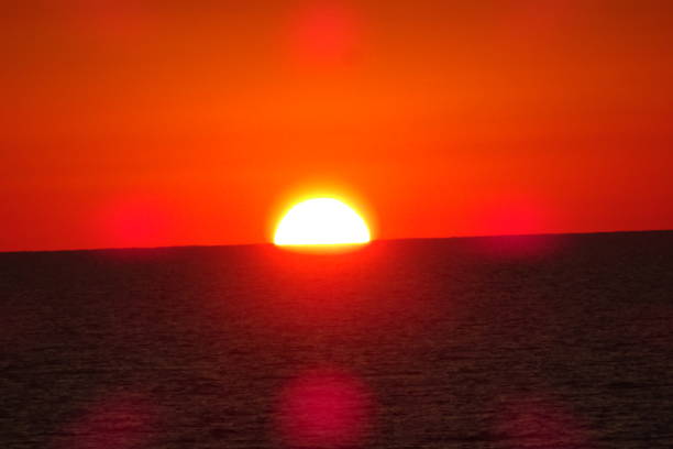 istock Sunset at the sea 1359530276