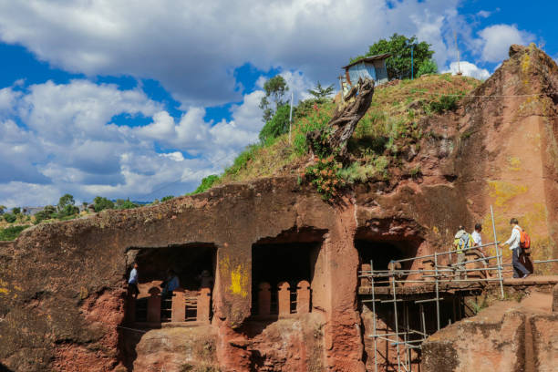Believers on the Church stone stairs in African town Lalibela, Ethiopia - August 20, 2020: Believers on the Church stone stairs in African town ancient ethiopia stock pictures, royalty-free photos & images