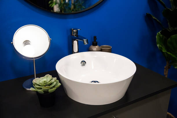 istock Modern white sink in bathroom interior close up view 1359531274