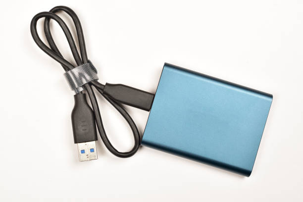 external hard drive with data cable on white background - usb cable drive usb flash drive flash imagens e fotografias de stock