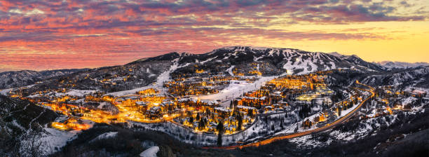 istock Snowmass Colorado skyline with ski slopes and sunset 1359535741
