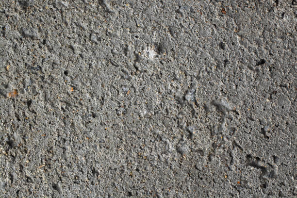 istock Abstract background of concrete wall close-up. 1359538618