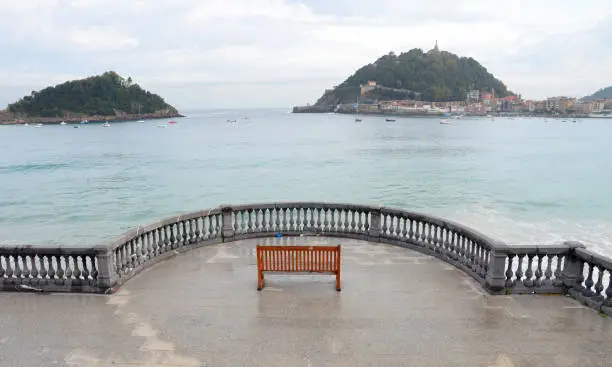 Photo of The promenade in San Sebastian (Spain) with a panoramic view of the Bahia de la Concha (Bay of the Shell)