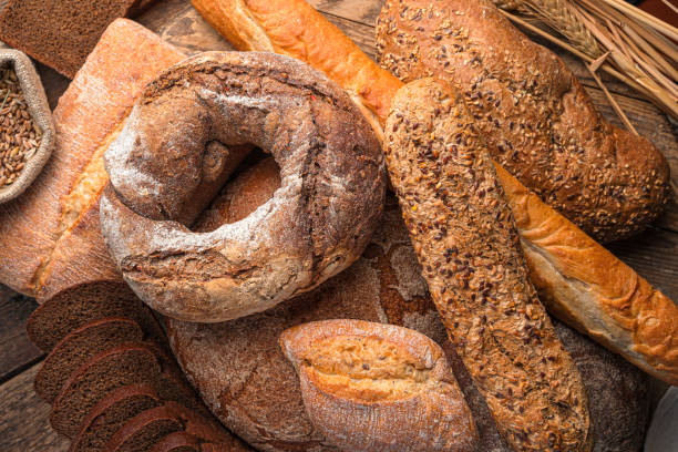 istock Bread close-up. Bakery products. Rye and wheat bread 1359544255