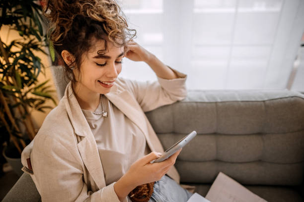 istock woman uses the phone 1359545394