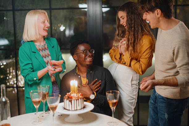 istock Friends celebrating birthday party 1359545899