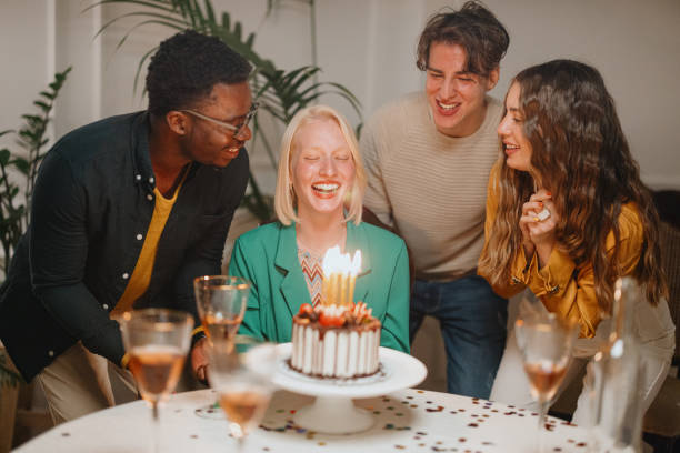 istock Friends celebrating birthday party 1359545949