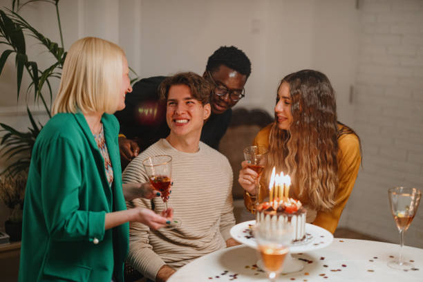 istock Friends celebrating birthday party 1359546002