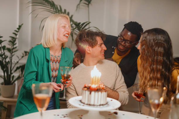 istock Friends celebrating birthday party 1359546021