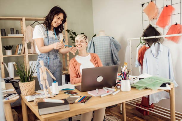 istock Two women making clothes at their workshop 1359546904