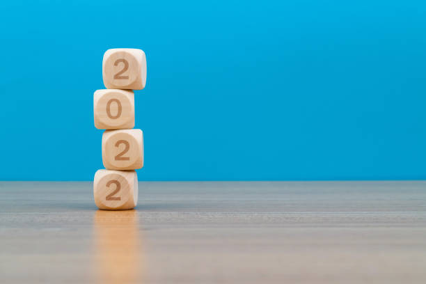 istock Wooden blocks with number 2022 on the table 1359547173