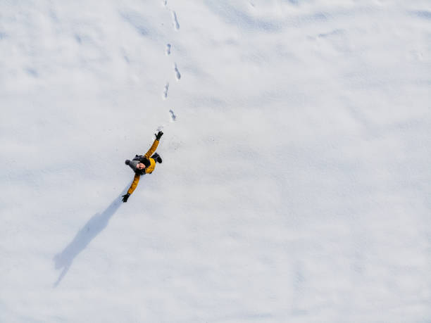 istock Young Woman On A Snowy Mountain 1359547638