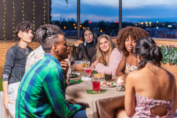 istock Friends celebrating New Year's Eve on balcony 1359549071