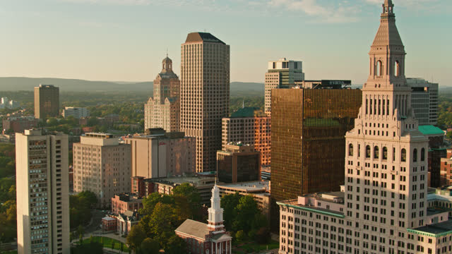 Drone Flight Over Historic Buildings in Hartford, CT Towards Office Towers