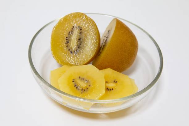 istock Gold kiwifruit on a plate on the table 1359551550