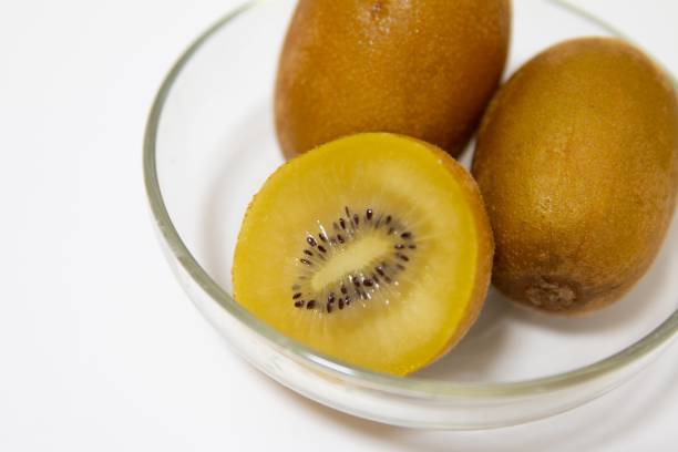 istock Gold kiwifruit on a plate on the table 1359551644