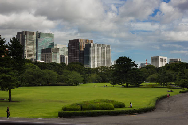 Tokyo, Japan- 11 May 2024: Main entrance of Imperial Palace, Tokyo. East National Gardens is a peaceful and historic garden with a mix of natural beauty and modern skyline