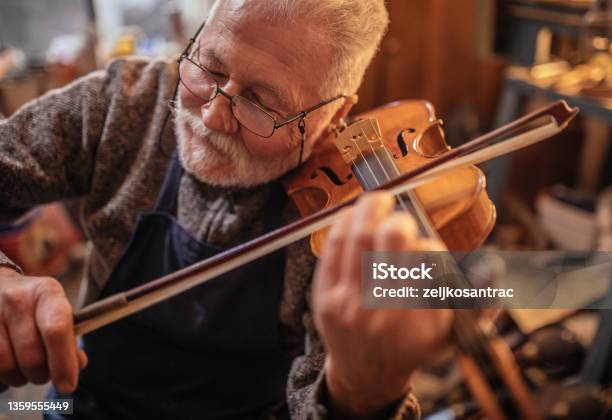 Senior Craftsman Making The Violin Stock Photo - Download Image Now - Accuracy, Manufacturing, Mature Adult
