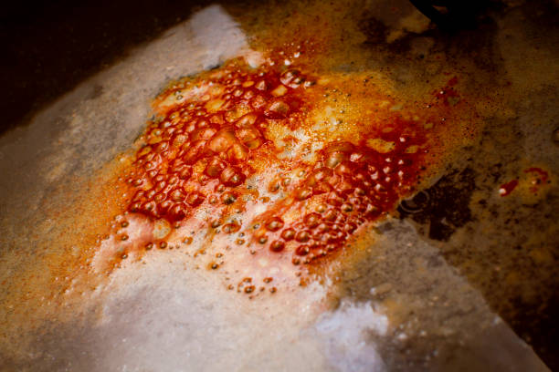 Bubbles formed on the surface during electrolysis rust removal stock photo