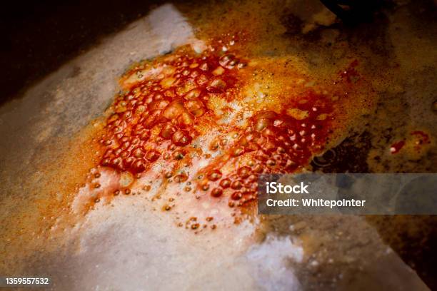 Bubbles Formed On The Surface During Electrolysis Rust Removal Stock Photo - Download Image Now