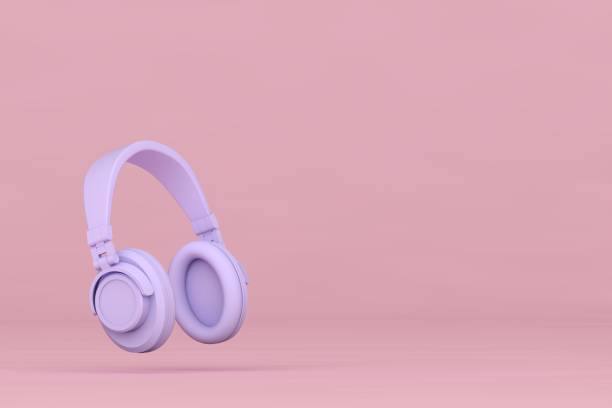 istock Purple headphone and empty product stand on pink background 1359560011
