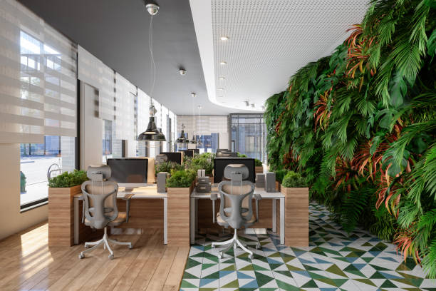 istock Eco-Friendly Modern Office Interior With Tables, Office Chairs, Pendant Lights And Vertical Garden. 1359560093