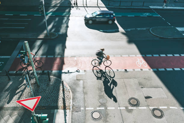 istock men on bicycle on crossroad in berlin 1359560169