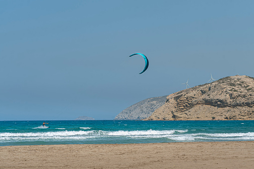 A kitesurfer in the sea at Prasonisi beach, Rhodes, Greece