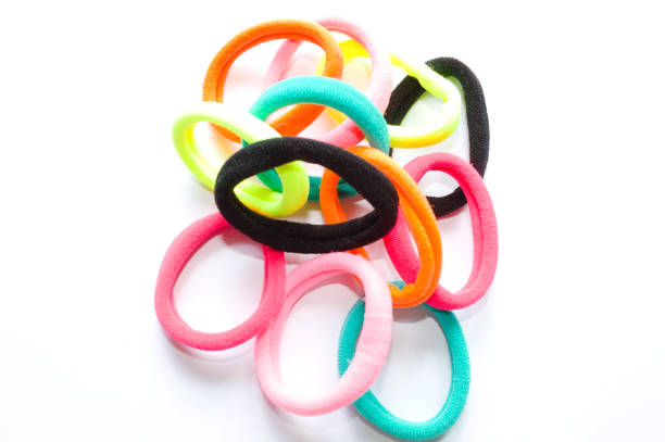 istock Elastic for hair with several colors and white background 1359565793