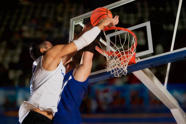 istock Two basketball players in action 1359568335