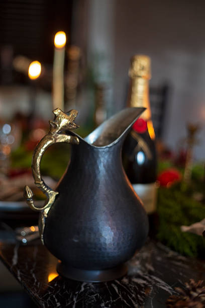 istock dinner table decoration decorative metal objects with candle and champagne blurry background 1359568362