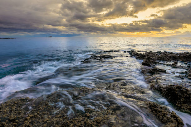 istock Beautiful sunset on Tenerife canary island coast 1359572832