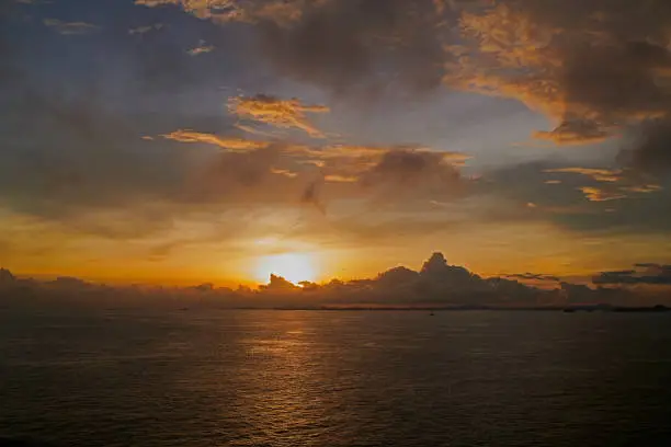 Stunning sunrise over the ocean from a cruiseship in Singapore, Singapore