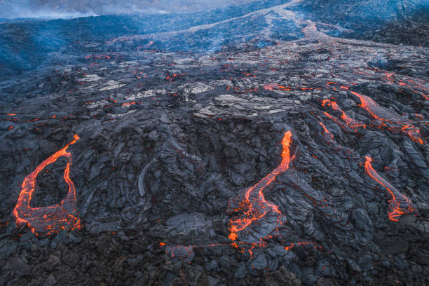 istock Drone view volcano caldera and flowing lava 1359573751