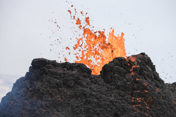 istock Drone view volcano caldera and flowing lava 1359573758