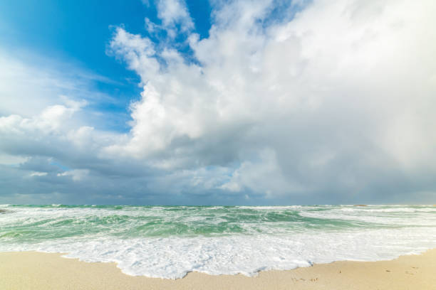 istock Dramatic sky over world famous Is Arutas beach 1359575833