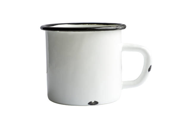 istock White blank Enamel Mug Mock-up isolated on white background. Blank cup for branding. High-resolution photo. 1359579771