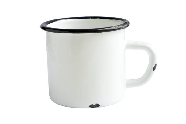 istock White blank Enamel Mug Mock-up isolated on white background. Blank cup for branding. High-resolution photo. 1359580443