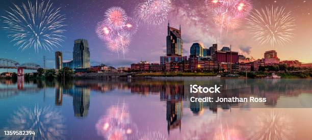 Nashville Cityscape With Milky Way Galaxy And Fireworks Stock Photo - Download Image Now