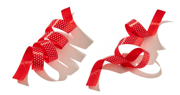 istock Set of two red dotted wavy ribbons isolated 1359585182