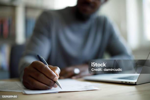 Man Working Stock Photo - Download Image Now - Writing - Activity, Handwriting, Tax Form