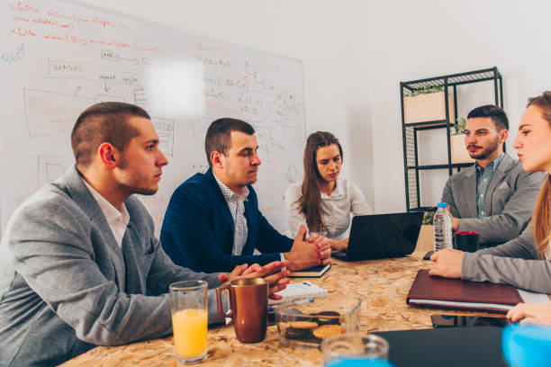 istock Business people having a briefing 1359603564