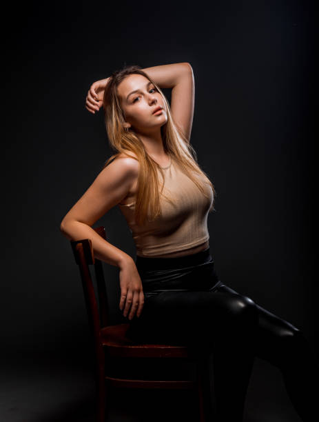 istock Beautiful modern girl posing in studio 1359605017